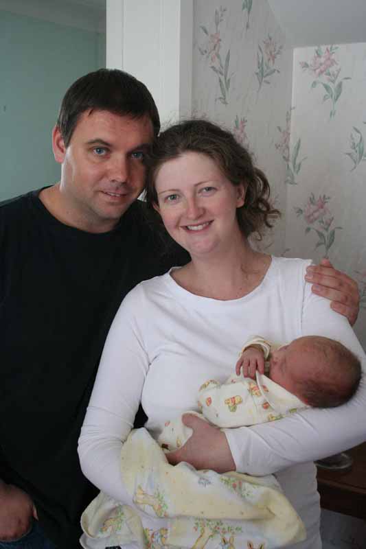 The happy family, on arrival from hospital