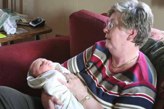 held by grandma