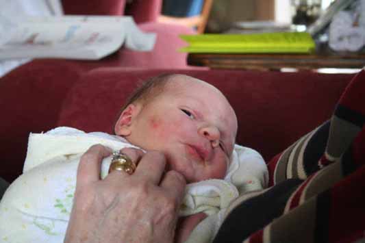 held by grandma